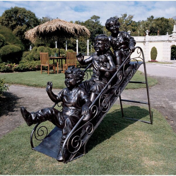 Three Children Sliding Into Summer Playground Art Sculpture kids